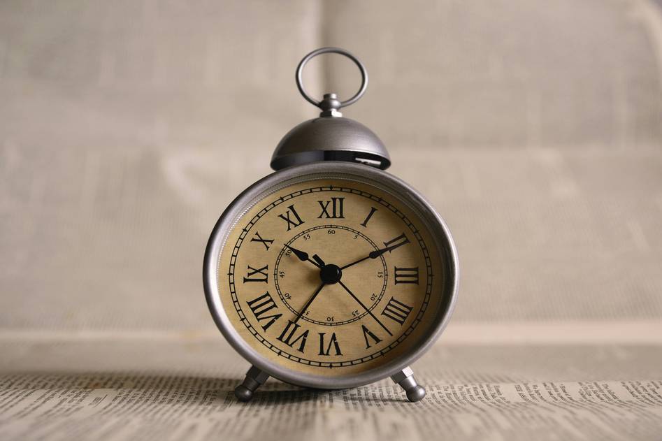 Modern smart clock on minimalist nightstand