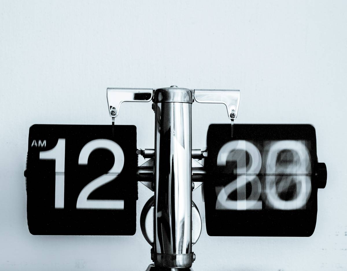 Side-by-side comparison of a smart clock with poor vs optimized day/night display settings showing glare vs soft illumination