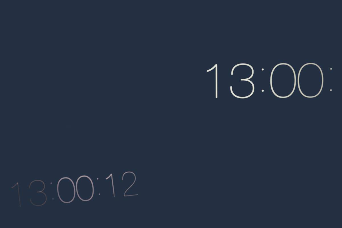 Smart clock interface design showing adaptive typography and warm color scheme at night