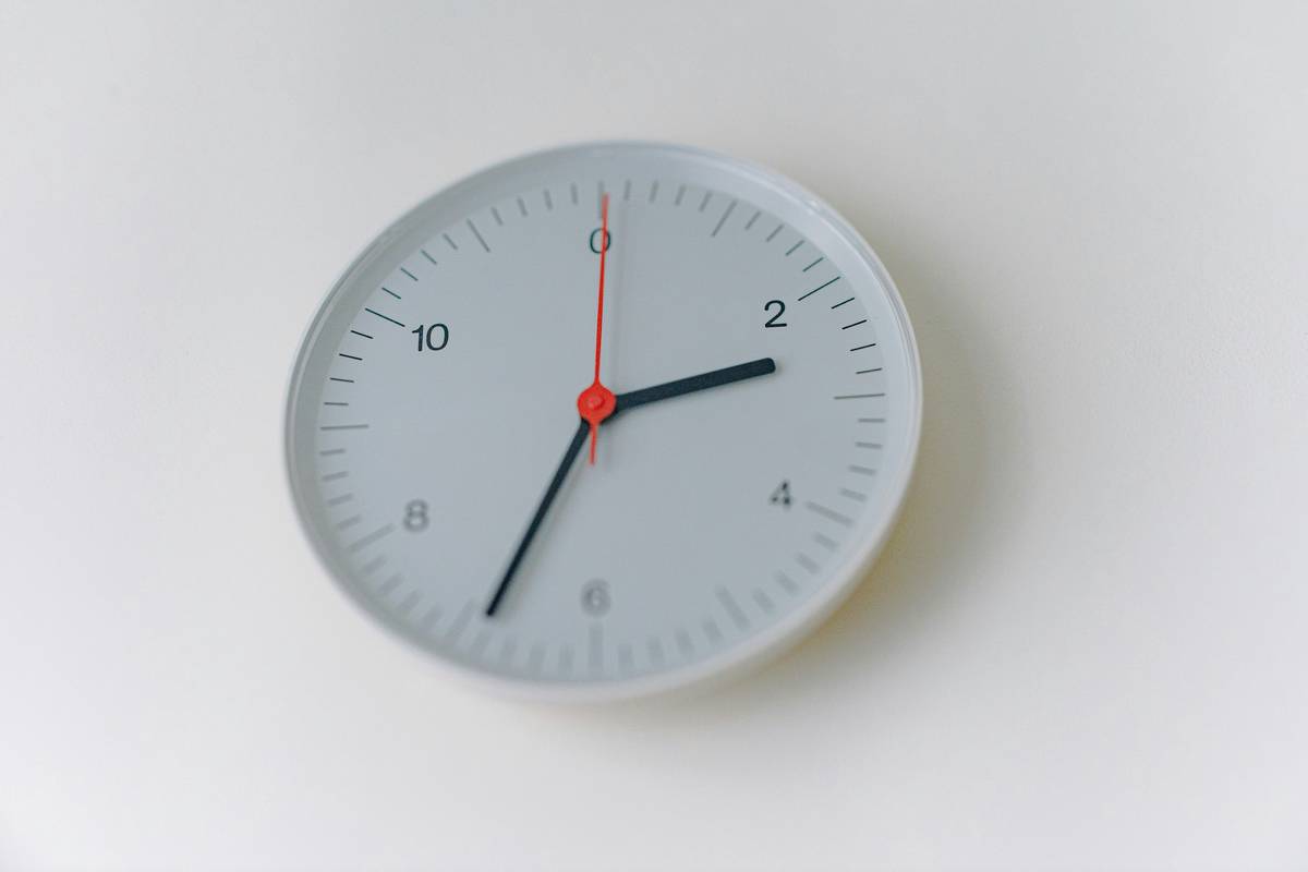 Close-up of smart clock analog display showing silent sweep second hand